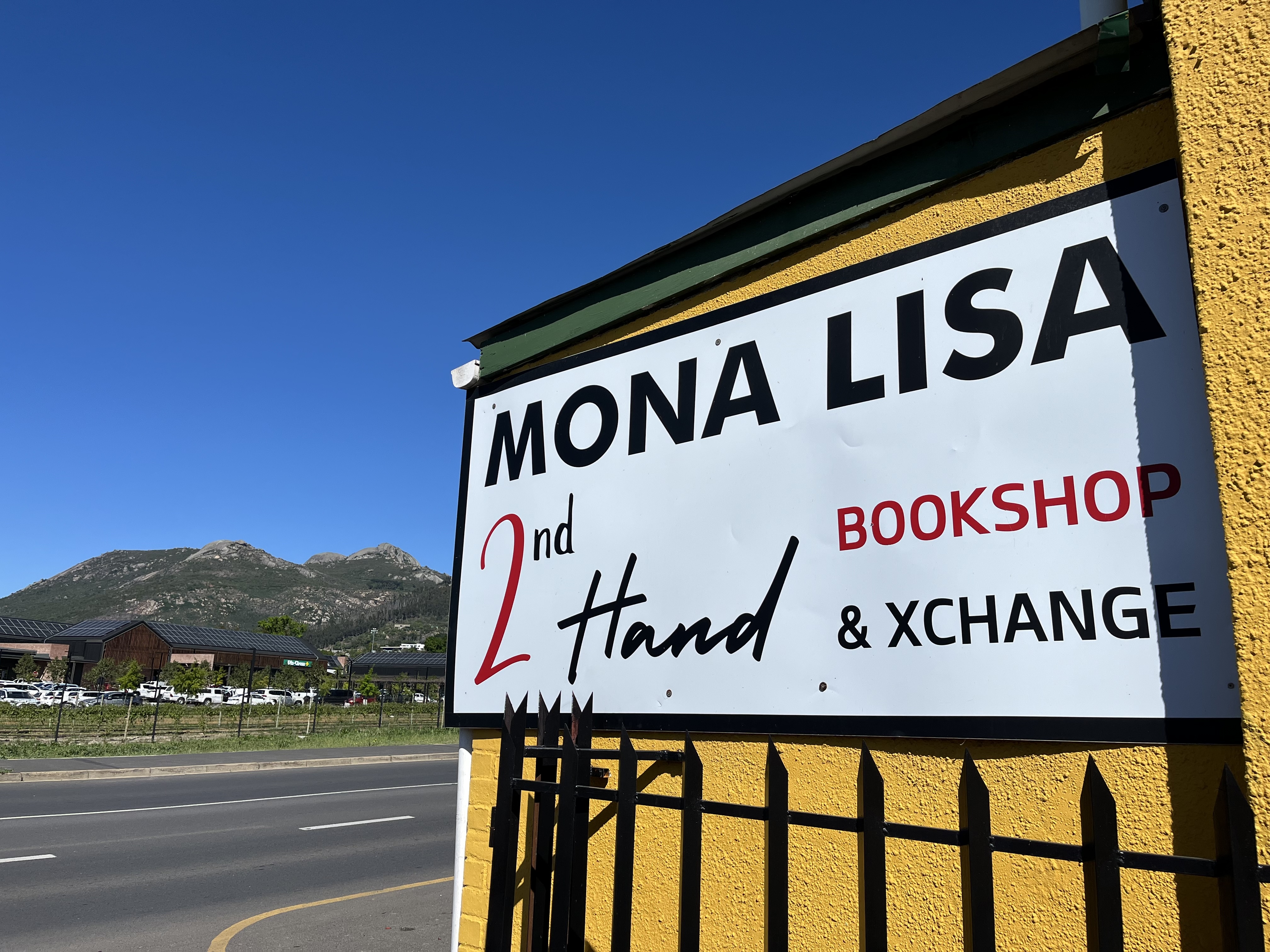 The Mona Lisa 2nd Hand Books sign outside the shop